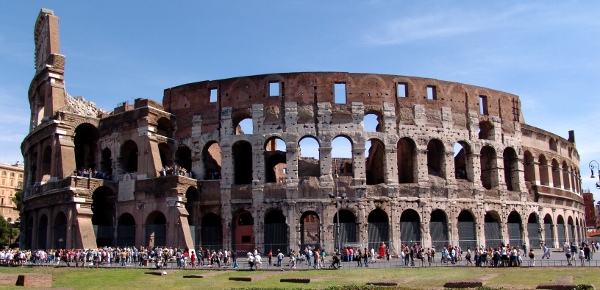 a wide photo of the Colosseum in Rome