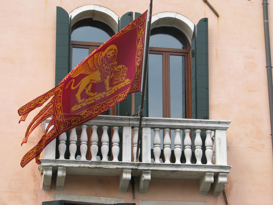 Venice's flag flying from a building