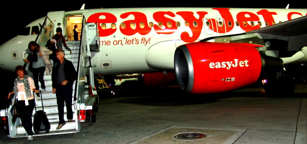 passengers disembarking from an easyJet aircraft